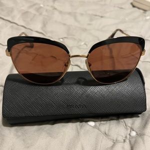 Prada black / gold cat eye sunglasses